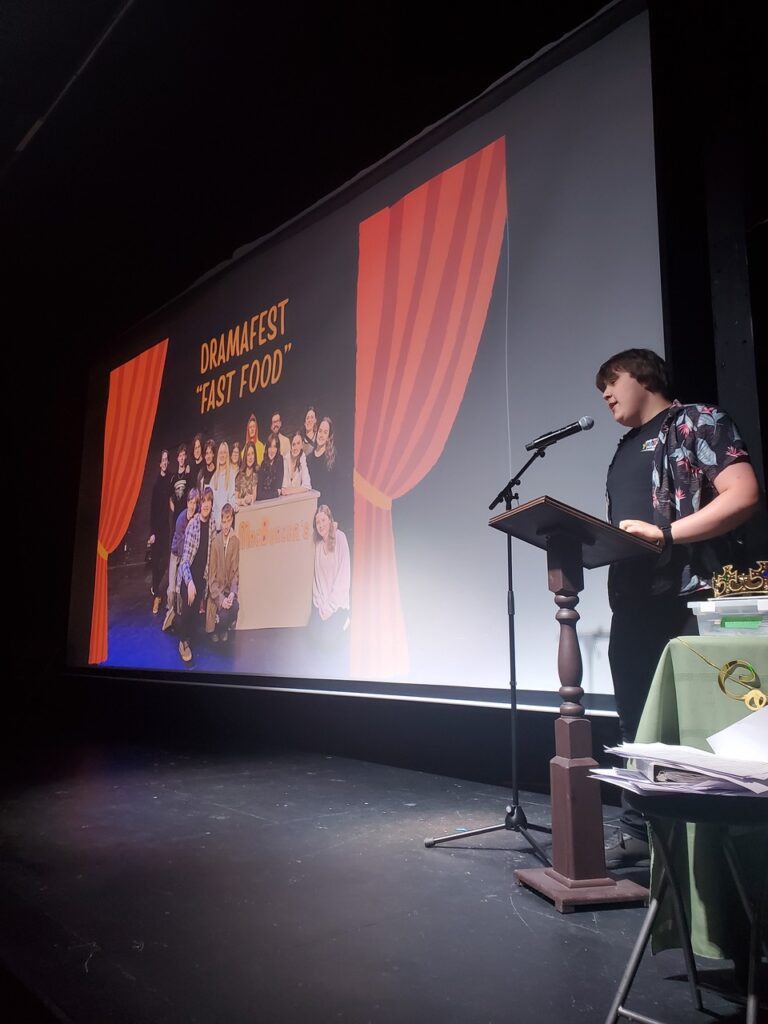 Duncan King  slide presentation after winning Best Director at a school theatre festival.